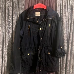 Navy polyester jacket sleeves can be rolled up or down& buttoned for cute style